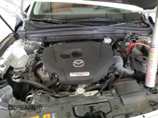 2023 Mazda CX-50 Premium Plus with VIN 7MMVABEY6PN132884, listed as a Copart auction lot 87292924 with 39,737 mi miles and Salvage Title. Bid and sale history available at DreamBid. Image 12.