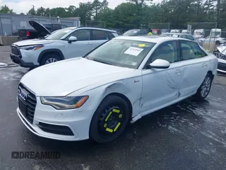 2014 Audi A6 Prestige with VIN WAUHGAFCXEN091050, listed as a IAAI auction lot 42524560 with 169,575 mi miles and . Bid and sale history available at DreamBid. Image 17.