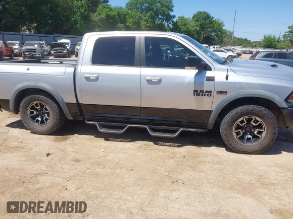 2016 Ram 1500 Rebel z VIN 1C6RR7YT7GS185173, wystawiony jako IAAI lot #42033684 z przebiegiem 152 758 mil mil oraz . Historia ofert i sprzedaży dostępna na DreamBid. Obrazek 13.