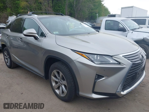 2018 Lexus RX 350 z VIN 2T2BZMCA4JC157690, wystawiony jako IAAI lot #42155397 z przebiegiem 104 075 mil mil oraz . Historia ofert i sprzedaży dostępna na DreamBid. Obrazek 1.