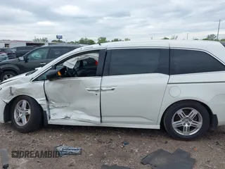 2013 Honda Odyssey Touring with VIN 5FNRL5H96DB074819, listed as a IAAI auction lot 41898358 with 123,428 mi miles and . Bid and sale history available at carsss.com. Image 14.