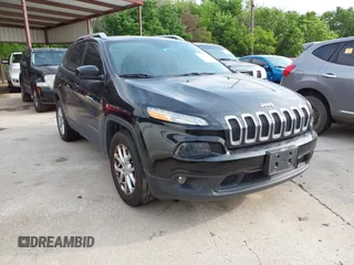 2014 Jeep Cherokee Latitude with VIN 1C4PJMCS5EW294743, listed as a IAAI auction lot 42098992 with 185,814 mi miles. Bid and sale history available at carsss.com. Image 1.