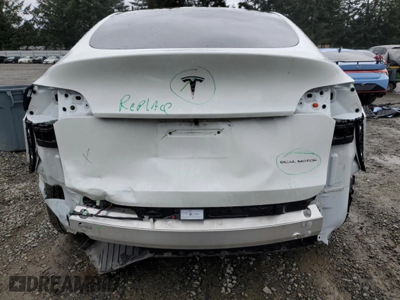 2023 Tesla Model Y Long Range z VIN 7SAYGDEE4PF836872, wystawiony jako Copart lot #45566235 z przebiegiem 7 674 mil mil oraz Szkoda całkowita • Salvage title. Historia ofert i sprzedaży dostępna na DreamBid. Obrazek 6.