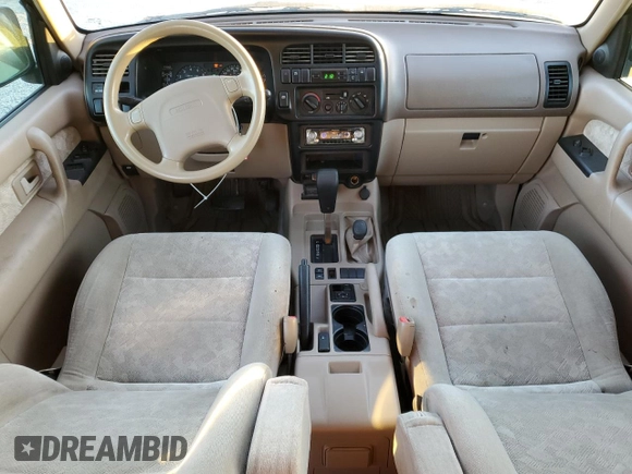 2002 Isuzu Trooper S with VIN JACDJ58X427J08532, listed as a Copart auction lot 84227494 with 166,636 mi miles and Salvage title. Bid and sale history available at DreamBid. Image 8.