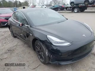 2019 Tesla Model 3 Mid Range with VIN 5YJ3E1EA5KF297213, listed as a IAAI auction lot 41361412 with 93,801 mi miles. Bid and sale history available at carsss.com. Image 1.