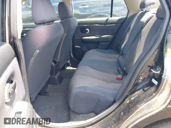 2007 Nissan Versa SL z VIN 3N1BC11E77L409483, wystawiony jako IAAI lot #42525328 z przebiegiem 102 488 mil mil oraz . Historia ofert i sprzedaży dostępna na DreamBid. Obrazek 8.