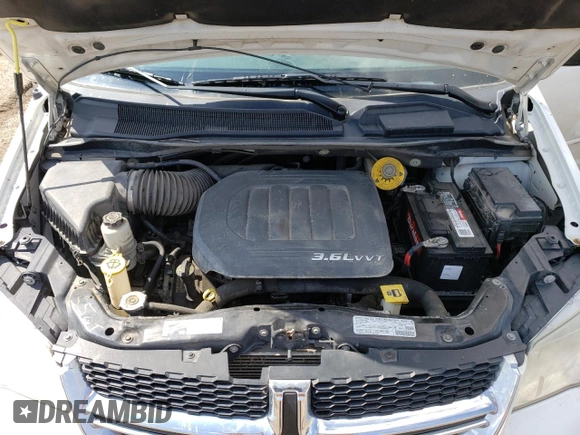 2013 Dodge Grand Caravan SE with VIN 2C4RDGBG9DR772944, listed as a Copart auction lot 56014894 with 193,635 mi miles and Salvage Title. Bid and sale history available at DreamBid. Image 13.