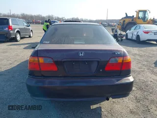 2000 Honda Civic LX with VIN 2HGEJ6675YH528894, listed as a IAAI auction lot 41800415 with 444,713 mi miles. Bid and sale history available at carsss.com. Image 16.