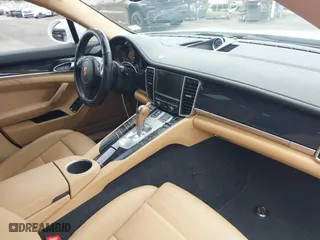 2015 Porsche Panamera 4 with VIN WP0AA2A71FL000458, listed as a IAAI auction lot 41862221 with 66,946 mi miles. Bid and sale history available at carsss.com. Image 5.