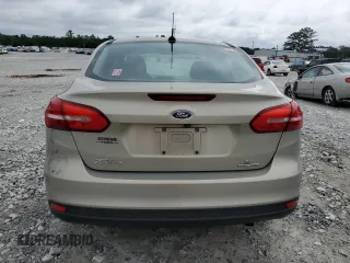 2016 Ford Focus SE z VIN 1FADP3F2XGL341167, wystawiony jako Copart lot #59042435 z przebiegiem 71 345 mil mil oraz Szkoda całkowita • Salvage title. Historia ofert i sprzedaży dostępna na DreamBid. Obrazek 6.
