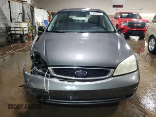 2005 Ford Focus S with VIN 3FAFP37N05R120564, listed as a Copart auction lot 49404935 with 102,254 mi miles and Salvage Title. Bid and sale history available at carsss.com. Image 5.