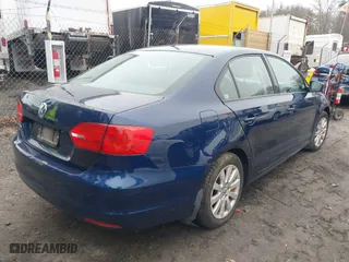 2014 Volkswagen Jetta Sedan S with VIN 3VW1K7AJ2EM421637, listed as a IAAI auction lot 41915643 with 127,258 mi miles. Bid and sale history available at carsss.com. Image 4.