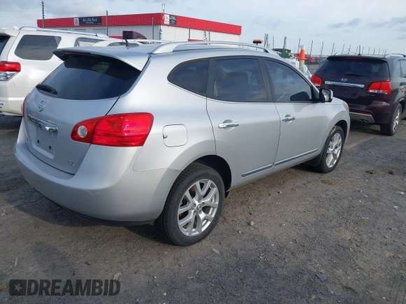 2013 Nissan Rogue S with VIN JN8AS5MT6DW005369, listed as a IAAI auction lot 42032295 with 133,217 mi miles and . Bid and sale history available at DreamBid. Image 4.