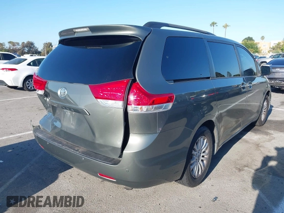2011 Toyota Sienna XLE AAS with VIN 5TDYK3DC6BS072856, listed as a IAAI auction lot 42684298 with 113,202 mi miles and . Bid and sale history available at DreamBid. Image 4.
