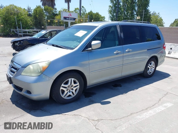 2006 Honda Odyssey EX-L z VIN 5FNRL38716B051664, wystawiony jako IAAI lot #42520320 z przebiegiem 304 835 mil mil oraz . Historia ofert i sprzedaży dostępna na DreamBid. Obrazek 2.