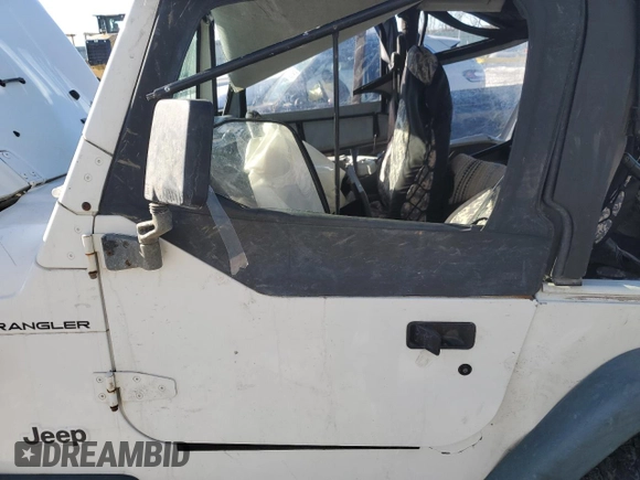 1998 Jeep Wrangler SE with VIN 1J4FY29P0WP707480, listed as a Copart auction lot 88546815 with 0 mi miles and Salvage Title. Bid and sale history available at carsss.com. Image 7.