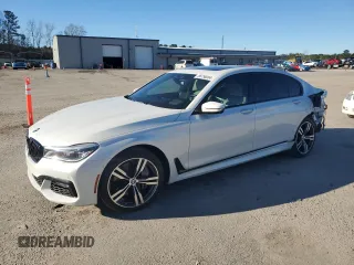 2019 BMW 7 Series 750i with VIN WBA7F0C5XKGM25897, listed as a Copart auction lot 86758004 with 68,700 mi miles and Salvage Title. Bid and sale history available at carsss.com. Image 1.