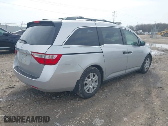 2013 Honda Odyssey LX with VIN 5FNRL5H22DB086503, listed as a IAAI auction lot 42133471 with 223,200 mi miles and . Bid and sale history available at carsss.com. Image 4.