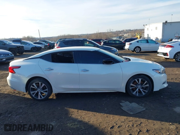 2018 Nissan Maxima SV with VIN 1N4AA6AP1JC405046, listed as a IAAI auction lot 41587285 with 77,799 mi miles and . Bid and sale history available at DreamBid. Image 12.