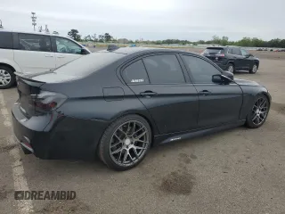 2014 BMW 3 Series 335i xDrive with VIN WBA3B9C55EF588272, listed as a Copart auction lot 58565145 with 88,085 mi miles and Salvage title. Bid and sale history available at DreamBid. Image 3.