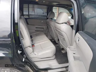 2011 Honda Pilot EX-L with VIN 5FNYF3H6XBB030039, listed as a IAAI auction lot 41596617 with 116,961 mi miles and . Bid and sale history available at DreamBid. Image 8.