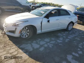 2015 Cadillac CTS RWD with VIN 1G6AP5SXXF0136820, listed as a Copart auction lot 54666385 with 129,763 mi miles and Clean title. Bid and sale history available at DreamBid. Image 1.