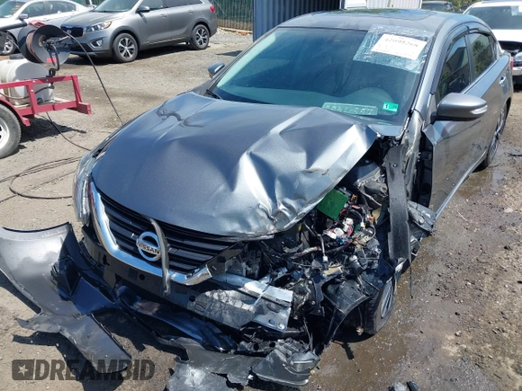 2017 Nissan Altima SV z VIN 1N4AL3AP6HC498990, wystawiony jako IAAI lot #42095268 z przebiegiem 105 253 mil mil oraz . Historia ofert i sprzedaży dostępna na DreamBid. Obrazek 6.