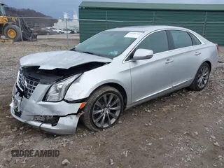 2013 Cadillac XTS Luxury with VIN 2G61P5S3XD9182910, listed as a IAAI auction lot 41940764 with 21,610 mi miles and . Bid and sale history available at DreamBid. Image 18.