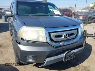 2009 Honda Pilot EX with VIN 5FNYF48439B036957, listed as a IAAI auction lot 41656284 with 199,115 mi miles. Bid and sale history available at carsss.com. Image 6.