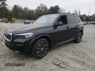 2022 BMW X5 xDrive40i with VIN 5UXCR6C05N9M87988, listed as a Copart auction lot 70896652 with 571 mi miles. Bid and sale history available at carsss.com. Image 1.
