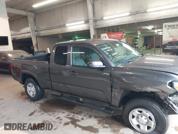 2020 Toyota Tacoma SR with VIN 3TYRX5GN5LT005461, listed as a IAAI auction lot 42020692 with 71,548 mi miles and . Bid and sale history available at DreamBid. Image 13.