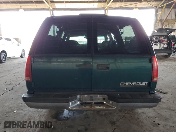 1997 Chevrolet Suburban with VIN 3GNEC16RXVG178307, listed as a Copart auction lot 48878935 with 179,717 mi miles and Salvage Title. Bid and sale history available at carsss.com. Image 6.
