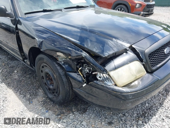 2005 Ford Police Interceptor z VIN 2FAHP71WX5X158807, wystawiony jako IAAI lot #42282107 z przebiegiem 153 787 mil mil oraz . Historia ofert i sprzedaży dostępna na DreamBid. Obrazek 6.