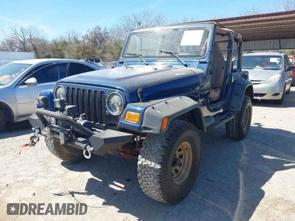 2000 Jeep Wrangler Sport with VIN 1J4FA49S0YP770943, listed as a IAAI auction lot 41817600 with 165,379 mi miles and . Bid and sale history available at DreamBid. Image 2.