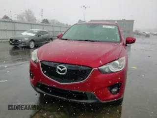 2014 Mazda CX-5 Grand Touring with VIN JM3KE4DY6E0309925, listed as a Copart auction lot 53521105 with 161,579 mi miles and Salvage Title. Bid and sale history available at carsss.com. Image 15.