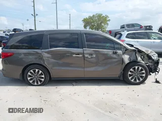 2022 Honda Odyssey EX-L with VIN 5FNRL6H77NB031502, listed as a IAAI auction lot 41706098 with 57,074 mi miles and . Bid and sale history available at DreamBid. Image 13.