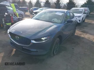2023 Mazda CX-30 S Carbon Edition with VIN 3MVDMBCM1PM573317, listed as a IAAI auction lot 41785371 with 6,475 mi miles and . Bid and sale history available at DreamBid. Image 2.