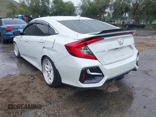 2020 Honda Civic Si z VIN 2HGFC1E59LH707630, wystawiony jako IAAI lot #41764310 z przebiegiem 116 714 mil mil oraz . Historia ofert i sprzedaży dostępna na DreamBid. Obrazek 3.