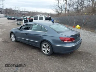 2013 Volkswagen CC Sport with VIN WVWBP7AN8DE513898, listed as a IAAI auction lot 41694857 with 67,440 mi miles. Bid and sale history available at carsss.com. Image 3.