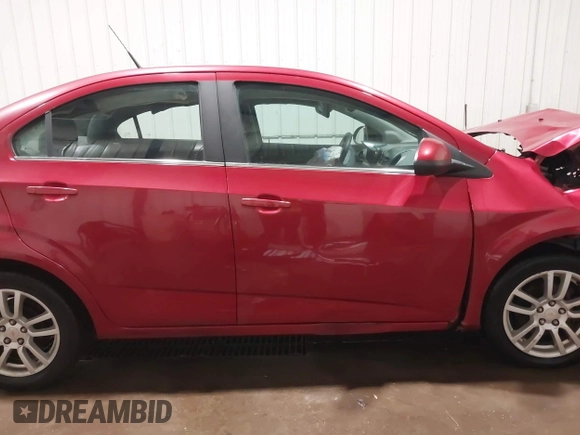2012 Chevrolet Sonic LT with VIN 1G1JC5SH7C4150737, listed as a IAAI auction lot 41743667 with 182,261 mi miles and . Bid and sale history available at DreamBid. Image 13.