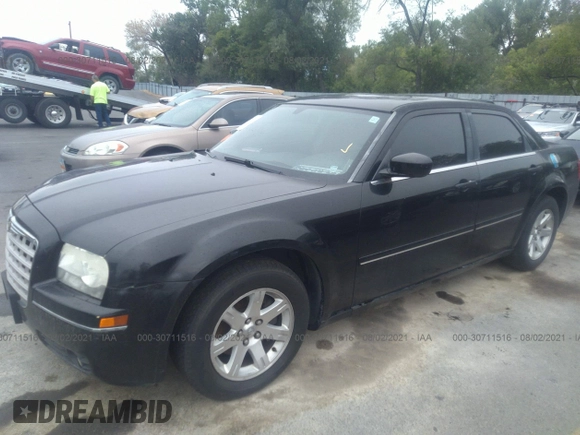 2005 Chrysler 300 Touring with VIN 2C3JA53G85H684276, listed as a IAAI auction lot 30711516 with 76,445 mi miles and . Bid and sale history available at DreamBid. Image 2.