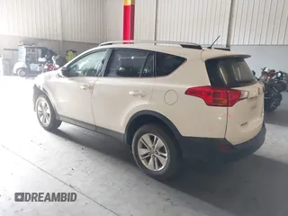 2014 Toyota RAV4 LE with VIN JTMBFREV8EJ005559, listed as a IAAI auction lot 41963080 with 126,296 mi miles and . Bid and sale history available at DreamBid. Image 3.