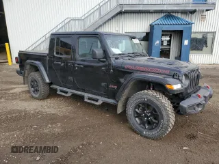 2022 Jeep Gladiator Rubicon with VIN 1C6JJTBG6NL118998, listed as a Copart auction lot 81451814 with 61,125 mi miles and Salvage title. Bid and sale history available at DreamBid. Image 4.