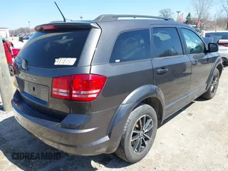 2018 Dodge Journey SE with VIN 3C4PDCAB5JT195635, listed as a IAAI auction lot 41987188 with 133,598 mi miles and . Bid and sale history available at DreamBid. Image 4.