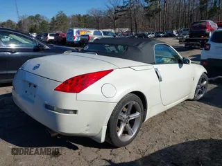2006 Nissan 350Z Touring with VIN JN1AZ36AX6M450609, listed as a IAAI auction lot 41227538 with 111,622 mi miles. Bid and sale history available at carsss.com. Image 4.