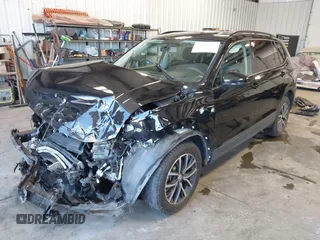 2021 Volkswagen Tiguan S with VIN 3VV0B7AX8MM020189, listed as a IAAI auction lot 42615767 with 70,294 mi miles and . Bid and sale history available at DreamBid. Image 18.