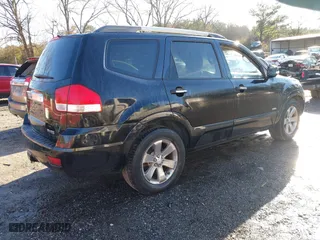 2009 Kia Borrego EX with VIN KNDJJ742X95034968, listed as a IAAI auction lot 41411206 with 146,584 mi miles. Bid and sale history available at carsss.com. Image 4.
