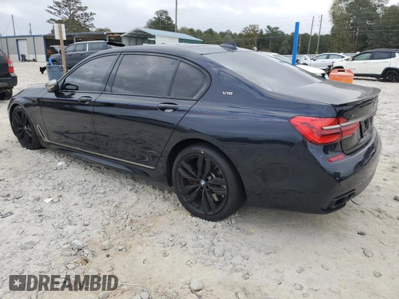 2019 BMW 7 Series M760i xDrive with VIN WBA7H6C51KG615276, listed as a Copart auction lot 79597234 with 39,195 mi miles and Salvage Title. Bid and sale history available at carsss.com. Image 2.