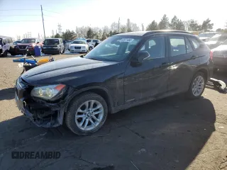 2015 BMW X1 xDrive28i with VIN WBAVL1C50FVY25782, listed as a Copart auction lot 42871465 with 116,084 mi miles and Salvage Title. Bid and sale history available at carsss.com. Image 1.