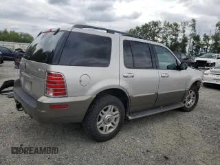 2004 Mercury Mountaineer Convenience z VIN 4M2ZU86W74ZJ27510, wystawiony jako Copart lot #62670205 z przebiegiem 108 285 mil mil oraz Szkoda całkowita • Salvage title. Historia ofert i sprzedaży dostępna na DreamBid. Obrazek 3.